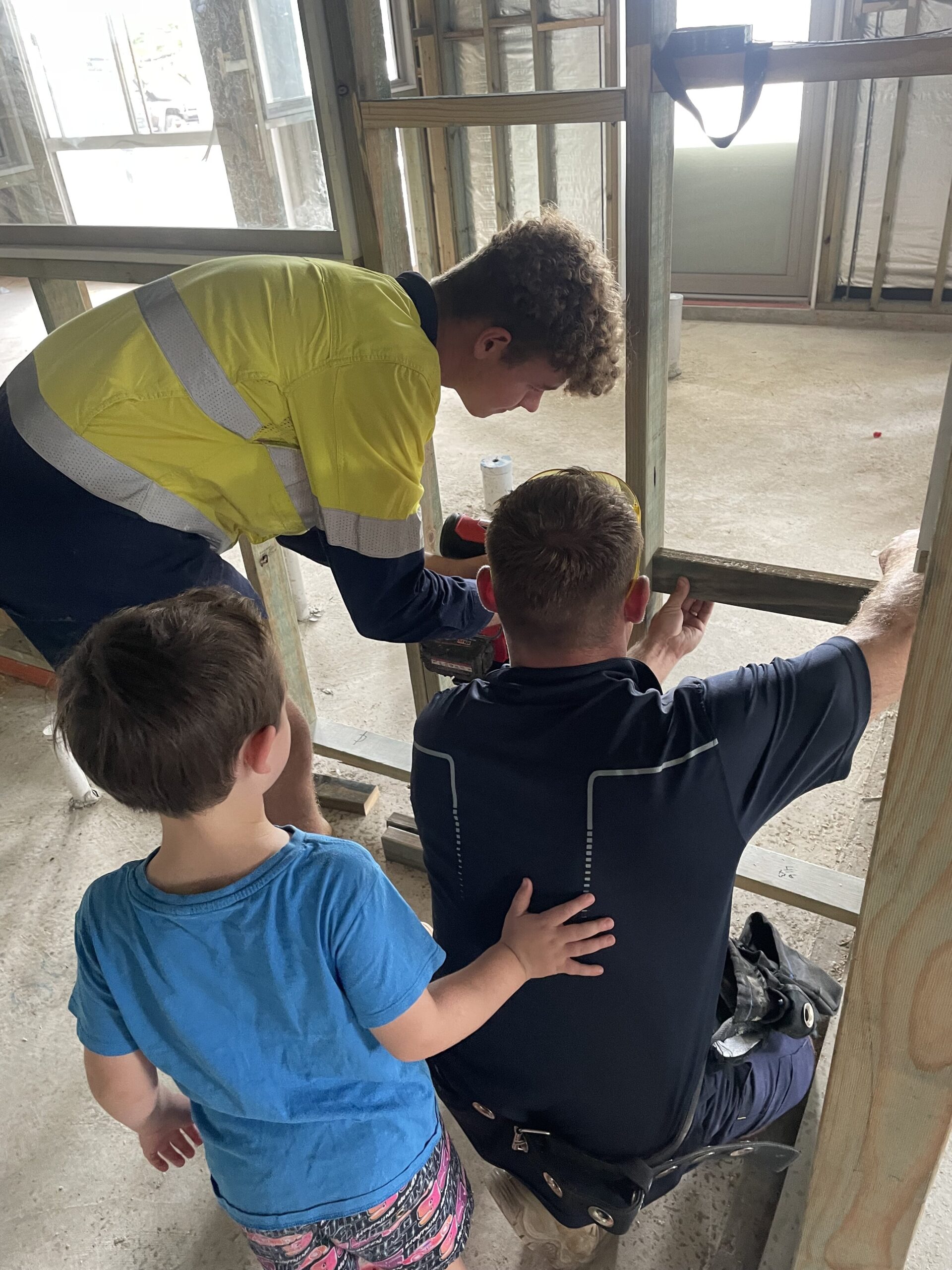 Reliable Plumbing Services in Moreton Bay – Expert plumbers fixing a kitchen sink leak.